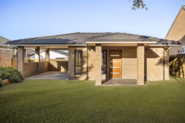 granny-flats-sydney-design-with-garage-bricks-veneer-front-porch-roof-tiles-solid-timber-front-door