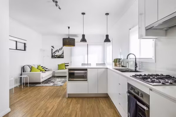 granny-flat-beach-style-bungalow-sydney-weathertex-kitchen-design-breakfast-bar-quatum-quartz-benchtop-westinghouse