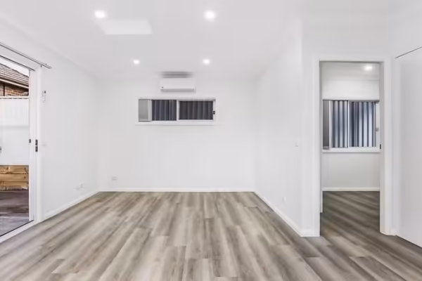 granny-flat-blue-gum-construction-corner-block-patio-living-timber-laminate-floor-2-bedrooms
