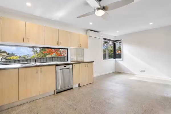 granny-flat-sydney-design-2bedroom-60sqm-polished-concrete-corner-window-glass-splashback-40mm-quantum-quartz-benchtop