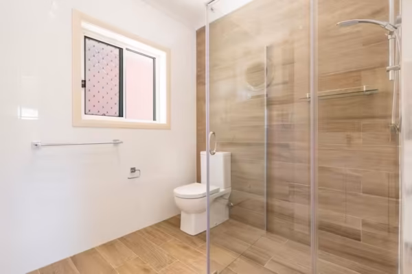 granny-flat-sydney-feature-wall-to-ceiling-tiles-glass-shower-screen-ostar-toilet